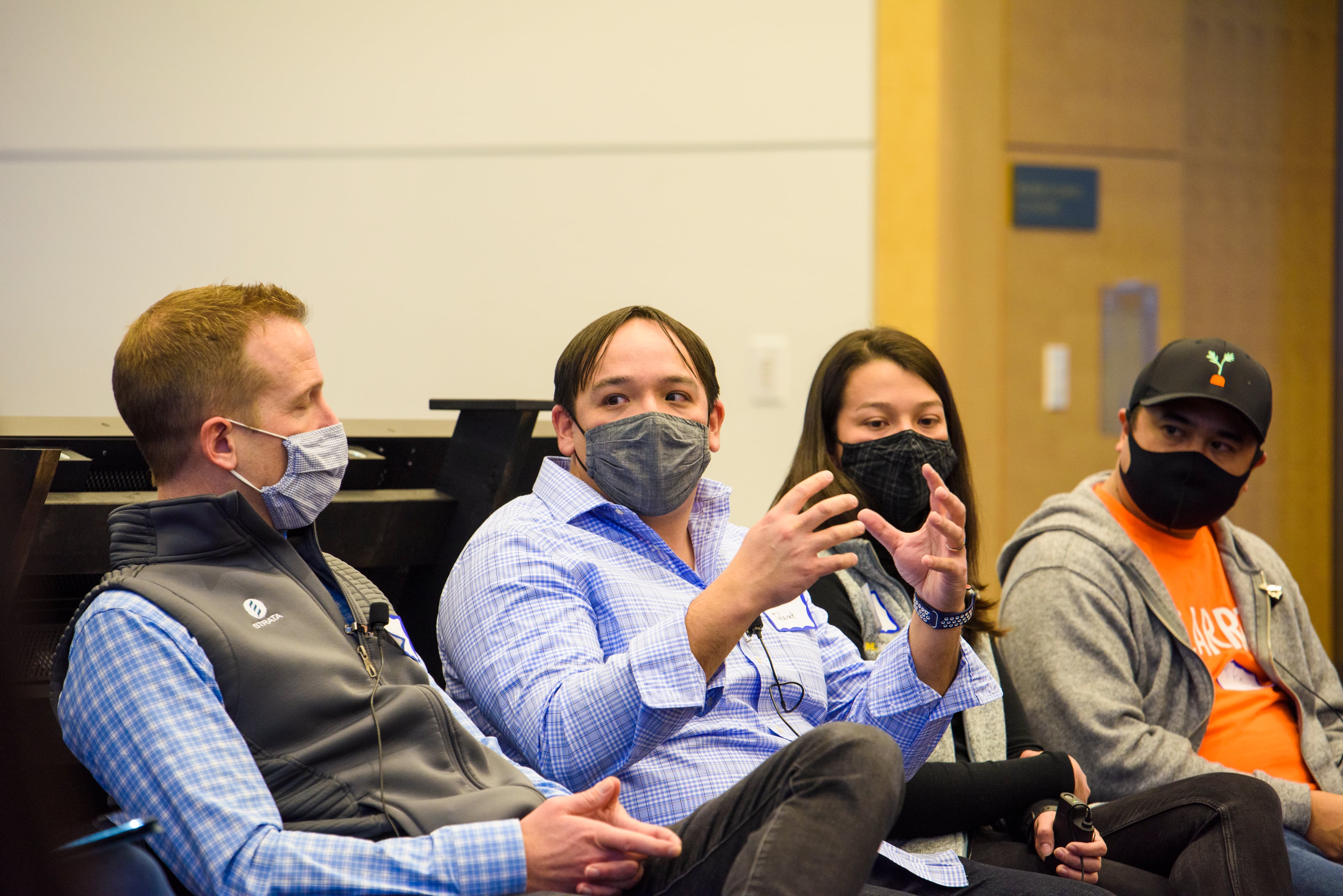 Phillip on a panel at a University of Michigan tech mixer, speaking alongside engineering and product leaders